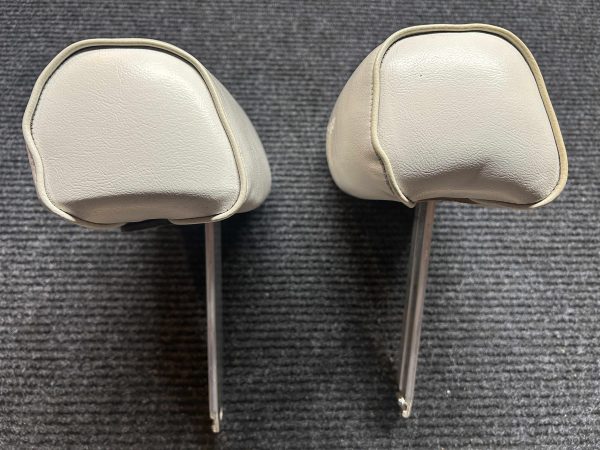 headrest on right show on small black spot which looks like a hole. It is very small spec.